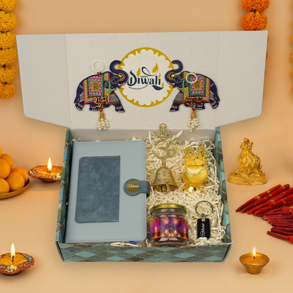 "Personalized Diwali Gift Hamper 2.0-BLUE“Dual Shade Diary, Metal Keychain, Om Brass Bell, Laxmi Ganesh Diya, Almond Jar & Shubh Labh Latkan – Festive Gift Box”