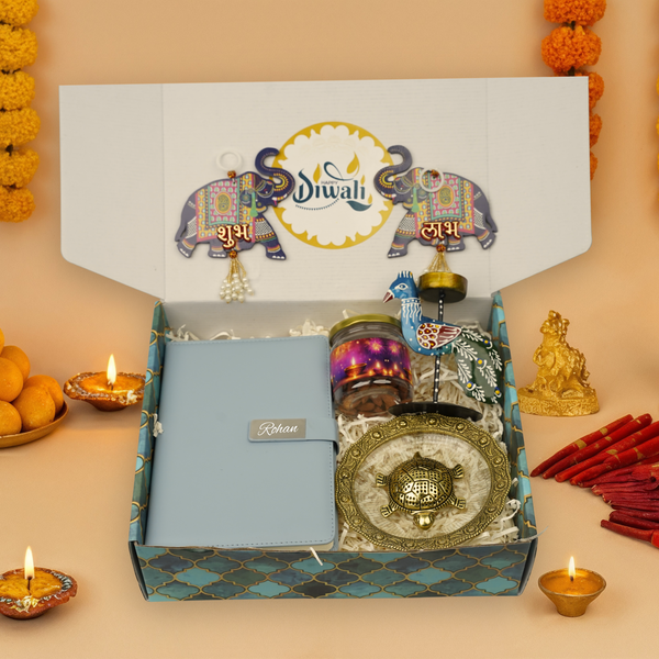 "Personalized Diwali Gift Hamper 4.0-BLUE✨ Metal Flip Diary, Kacchua with Glass Plate Lucky Charm, Peacock Tea Light Candle, Shubh Labh Latkan, Almond Jar & Designer Box | Festive Gift Hamper 🎁