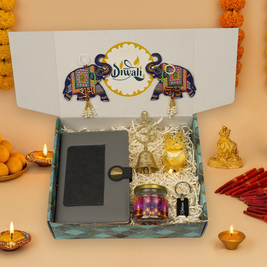 "Personalized Diwali Gift Hamper 2.0-GREY “Dual Shade Diary, Metal Keychain, Om Brass Bell, Laxmi Ganesh Diya, Almond Jar & Shubh Labh Latkan – Festive Gift Box”