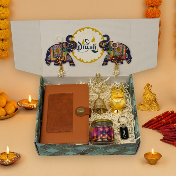 "Personalized Diwali Gift Hamper 2.0-BROWN “Dual Shade Diary, Metal Keychain, Om Brass Bell, Laxmi Ganesh Diya, Almond Jar & Shubh Labh Latkan – Festive Gift Box”